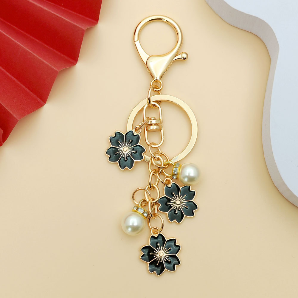 Breloczek z perłą, uroczy, szy – Women'S Ysl Fashion recenzja i cena